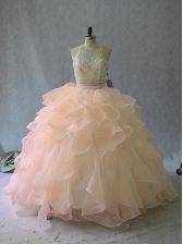 Nice Sleeveless Organza Backless Quince Ball Gowns in Peach with Beading and Ruffles