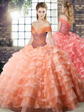 Affordable Sleeveless Beading and Ruffled Layers Lace Up Quinceanera Gowns with Peach Brush Train