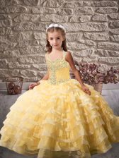 Enchanting Gold Pageant Gowns For Girls Party and Sweet 16 and Wedding Party with Beading and Ruffled Layers Straps Sleeveless Brush Train Lace Up