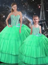  Sleeveless Organza Floor Length Lace Up Quince Ball Gowns in Apple Green with Ruffled Layers