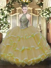  Gold Halter Top Neckline Beading and Ruffles Quinceanera Gown Sleeveless Lace Up