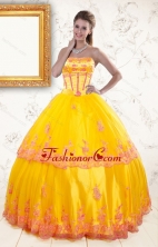2015 Exquisite Strapless Gold Quinceanera Dresses with Appliques XFNAO431FOR